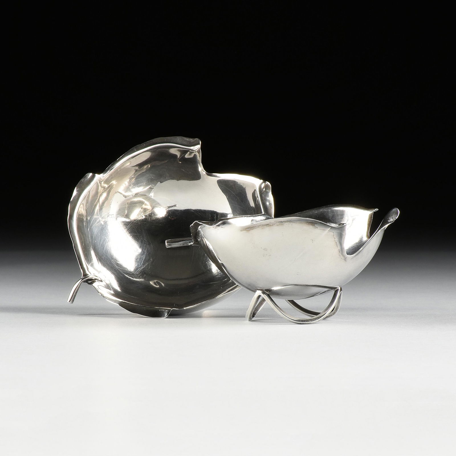 A PAIR OF CARTIER STERLING SILVER LEAF FORM CANDY/NUT (1 of 5)