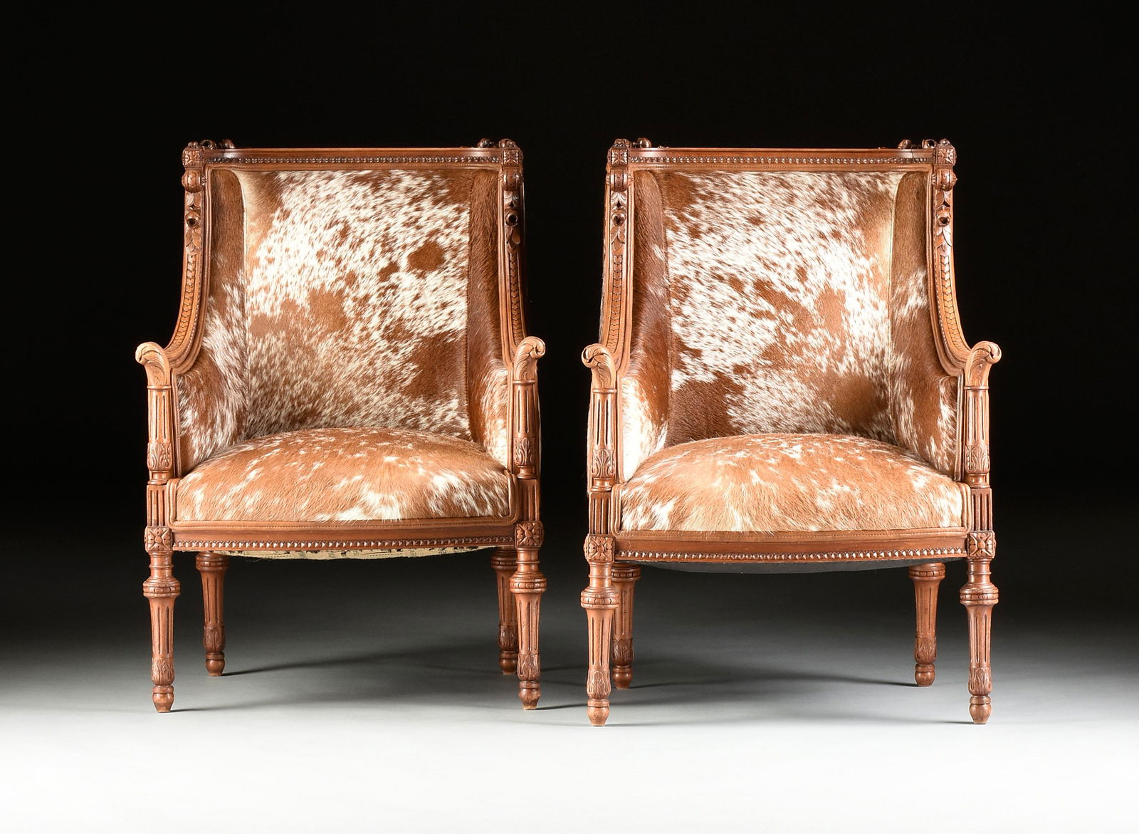 A PAIR OF LOUIS XVI REVIVAL COWHIDE UPHOLSTERED WALNUT (1 of 10)