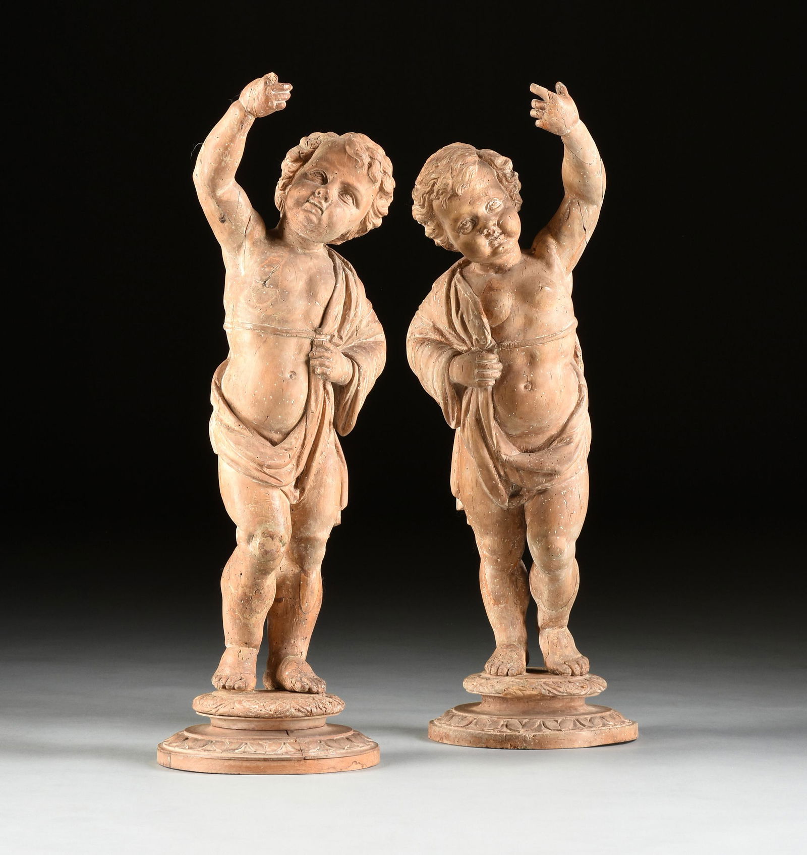 A PAIR OF ITALIAN BAROQUE CARVED LIMEWOOD PUTTI (1 of 16)