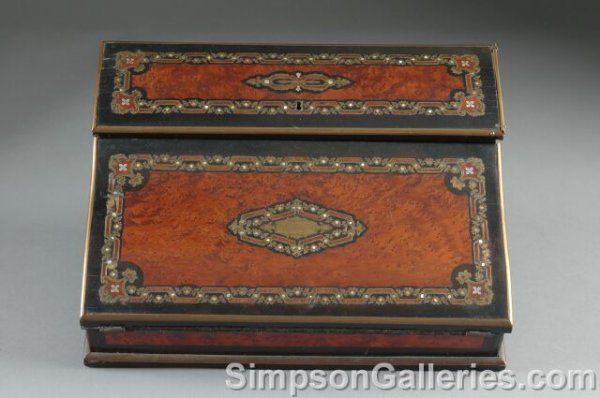 A NAPOLEON III MOTHER OF PEAR, IVORY AND BRONZE INL: A NAPOLEON III MOTHER OF PEAR, IVORY AND BRONZE INLAID BURLED MAHOGANY SLANT FRONT WRITING BOX, by Maison Alph-Giroux, Paris, third quarter 19th century, the serpentine rectangular case with arched hi