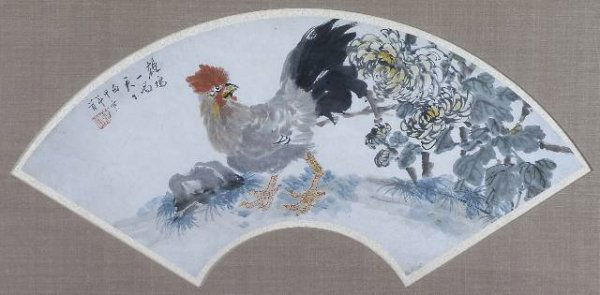 AN ANTIQUE CHINESE WATER COLOR PAINTED FAN, attribu: AN ANTIQUE CHINESE WATER COLOR PAINTED FAN, attributed to Chan Ban Ding, depicting a red plumed head rooster set amidst a blossoming landscape, signed and sealed. Height: 21", width: 8".