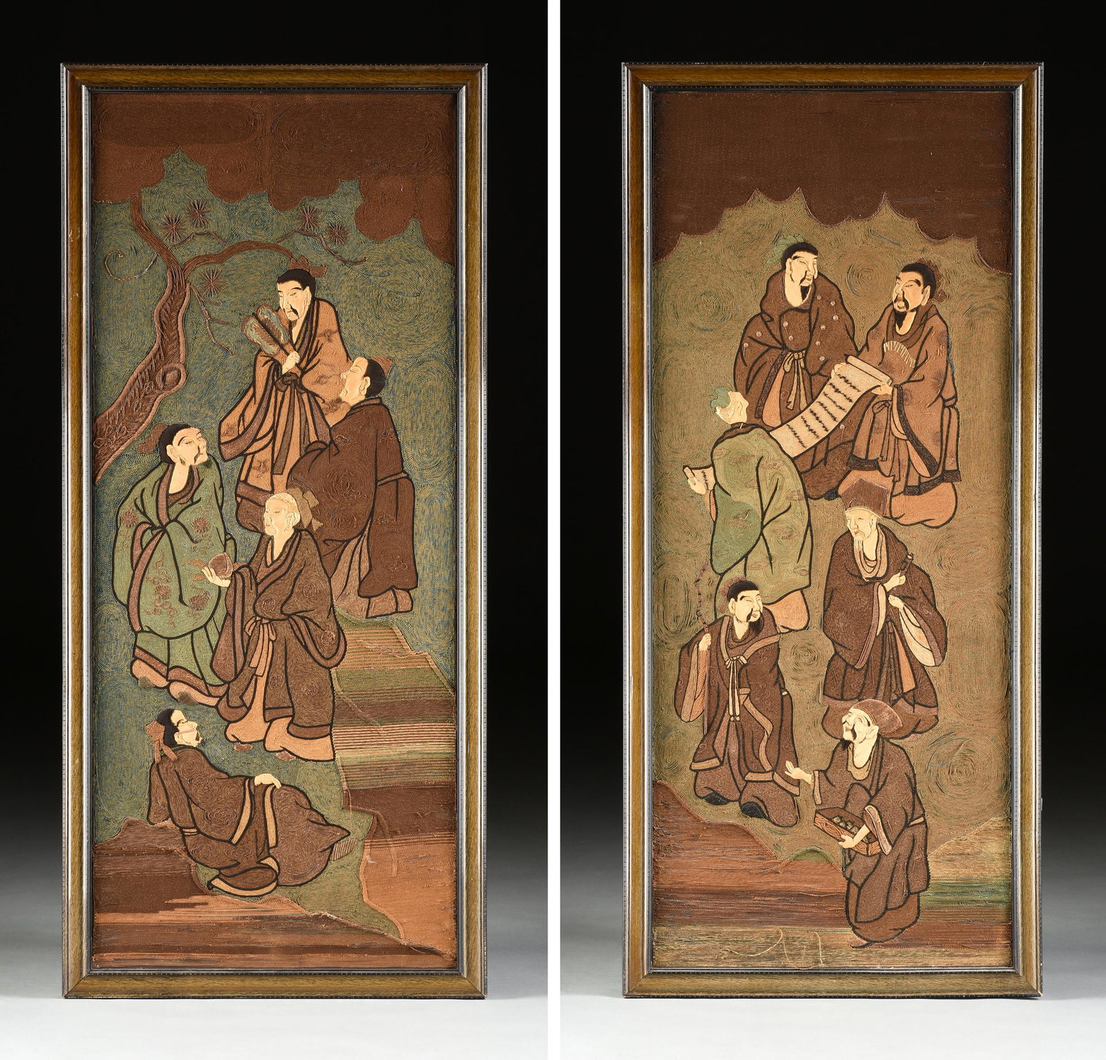 A PAIR OF CHINESE COUCHED EMBROIDERED "IMMORTALS IN THE: A PAIR OF CHINESE COUCHED EMBROIDERED "IMMORTALS IN THE GARDEN" TEXTILE PANELS, EARLY 20TH CENTURY, parcel gilt couched threads curled and embroidered to a painted panel. 54" x 22" Provenance: From th