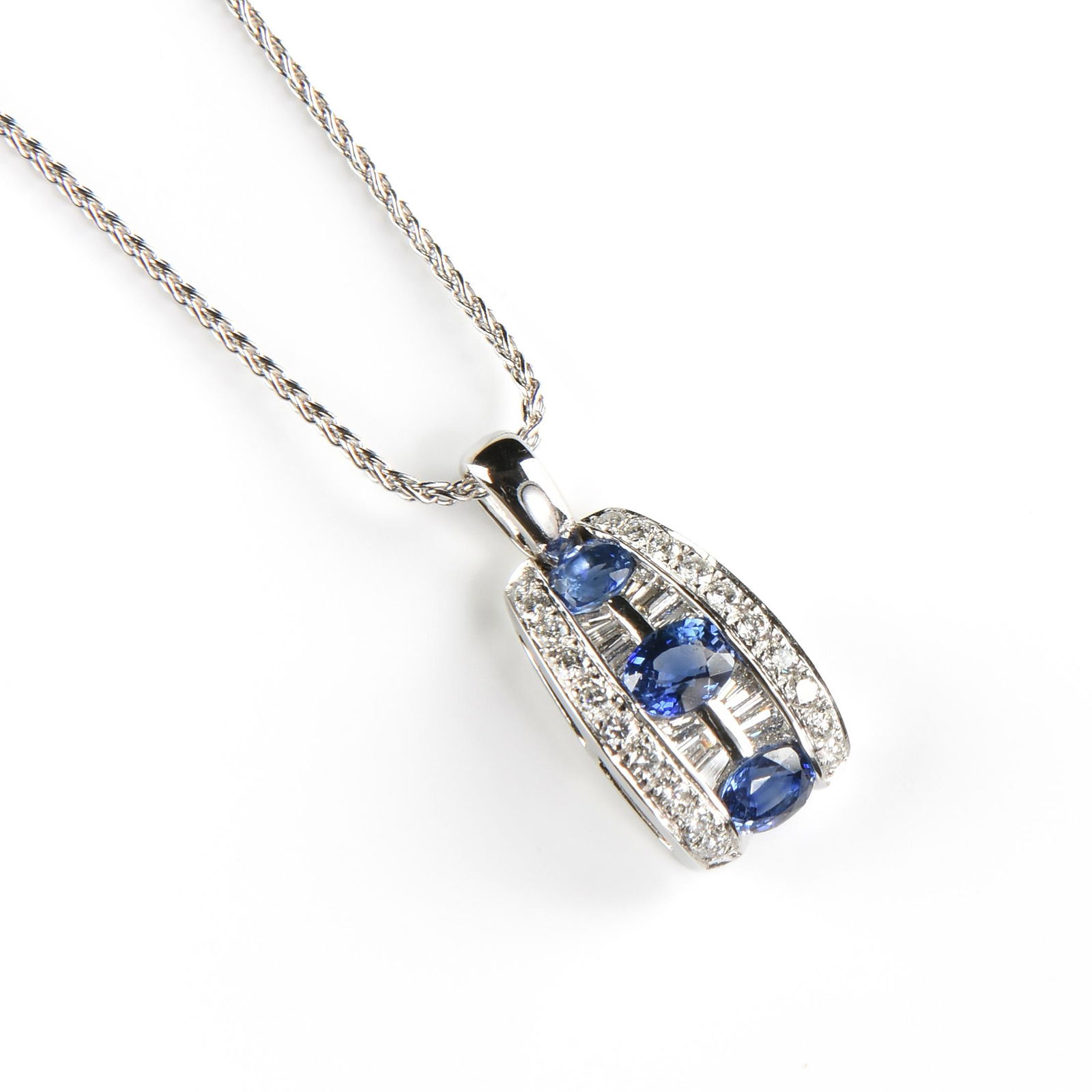 A DE HAGO STYLE 18K WHITE GOLD, DIAMOND, AND SAPPHIRE (1 of 2)