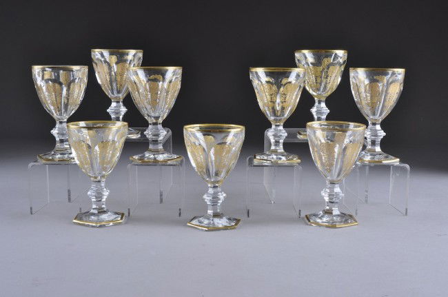 A SERVICE OF NINE BACCARAT CUT CRYSTAL WHITE WINE: A SERVICE OF NINE BACCARAT CUT CRYSTAL WHITE WINE GOBLETS IN THE EMPIRE PATTERN. Note: This pattern is used at "Castle Gandolfo" fifteen miles South East of Rome, the summer residence of the Pope. Hei