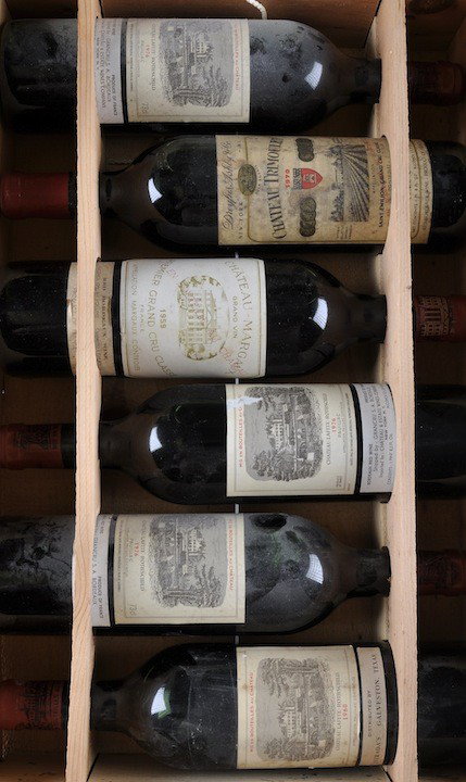 A COLLECTION OF SIX BOTTLES OF VINTAGE WINE compri: A COLLECTION OF SIX BOTTLES OF VINTAGE WINE comprising one bottle of Château Lafite Rothschild 1976, one bottle of Château Trimoulet Saint-Émilion Grand Cru Classe 1970, one bottle of Château Marg