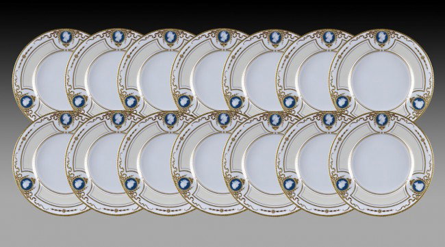A SET OF 14 MINTON PARCEL GILT PÂTE-SUR-PÂTE PLATE: A SET OF 14 MINTON PARCEL GILT PÂTE-SUR-PÂTE PLATES, FOR TIFFANY & CO, NEW YORK, PATTERN NUMBER H2877, CAMEOS SIGNED OR INITIALED A BIRKS, EARLY 20th CENTURY, each having three finely painted and to