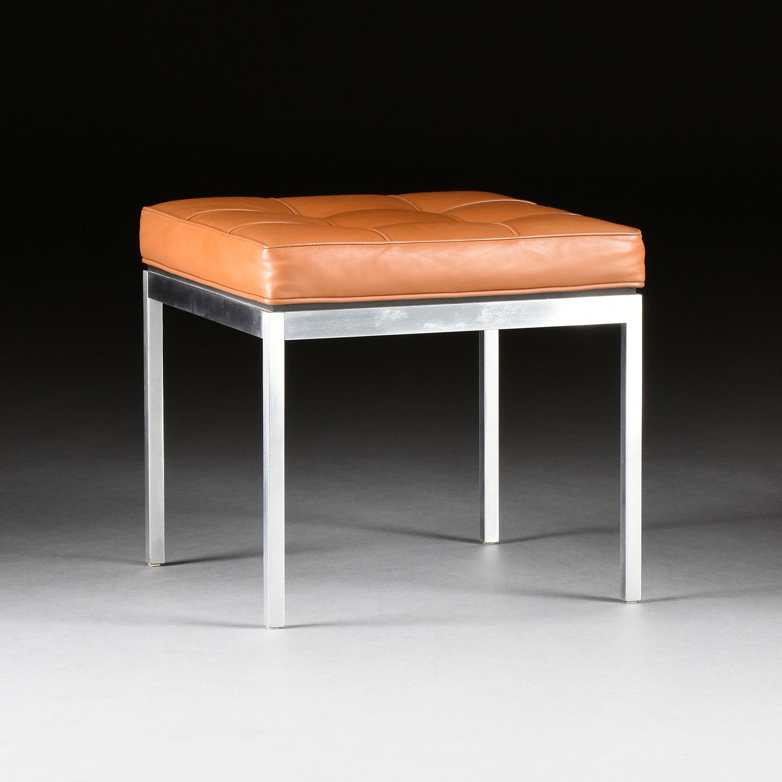 FLORENCE KNOLL (American 1917-2019) A LEATHER AND CHROMED STEEL “Relaxed Stool”, FOR (1 of 5)