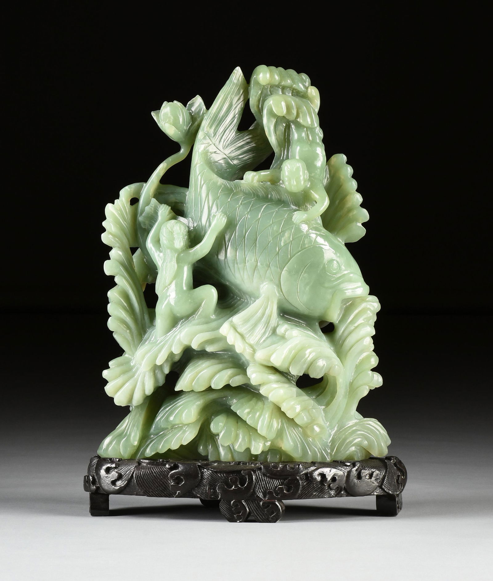 A LARGE CHINESE CARVED CELADON JADE GROUP "SWIMMING CARP AND CHILDREN," MODERN, (1 of 13)