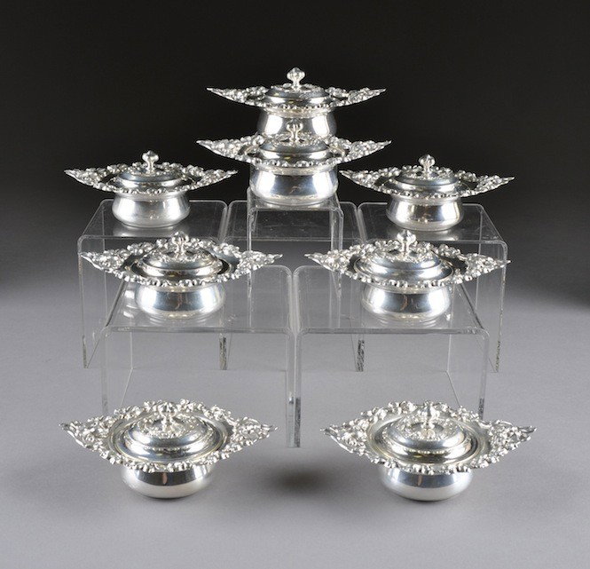 A SET OF EIGHT AMERICAN ART NOUVEAU STERLING SILVER: A SET OF EIGHT AMERICAN ART NOUVEAU STERLING SILVER INDIVIDUAL SAUCE TUREENS AND COVERS BY WOODSIDE, LATE 19TH/EARLY 20TH CENTURY, each of bombŽ circular form with beautifully cast rim of iris blosso