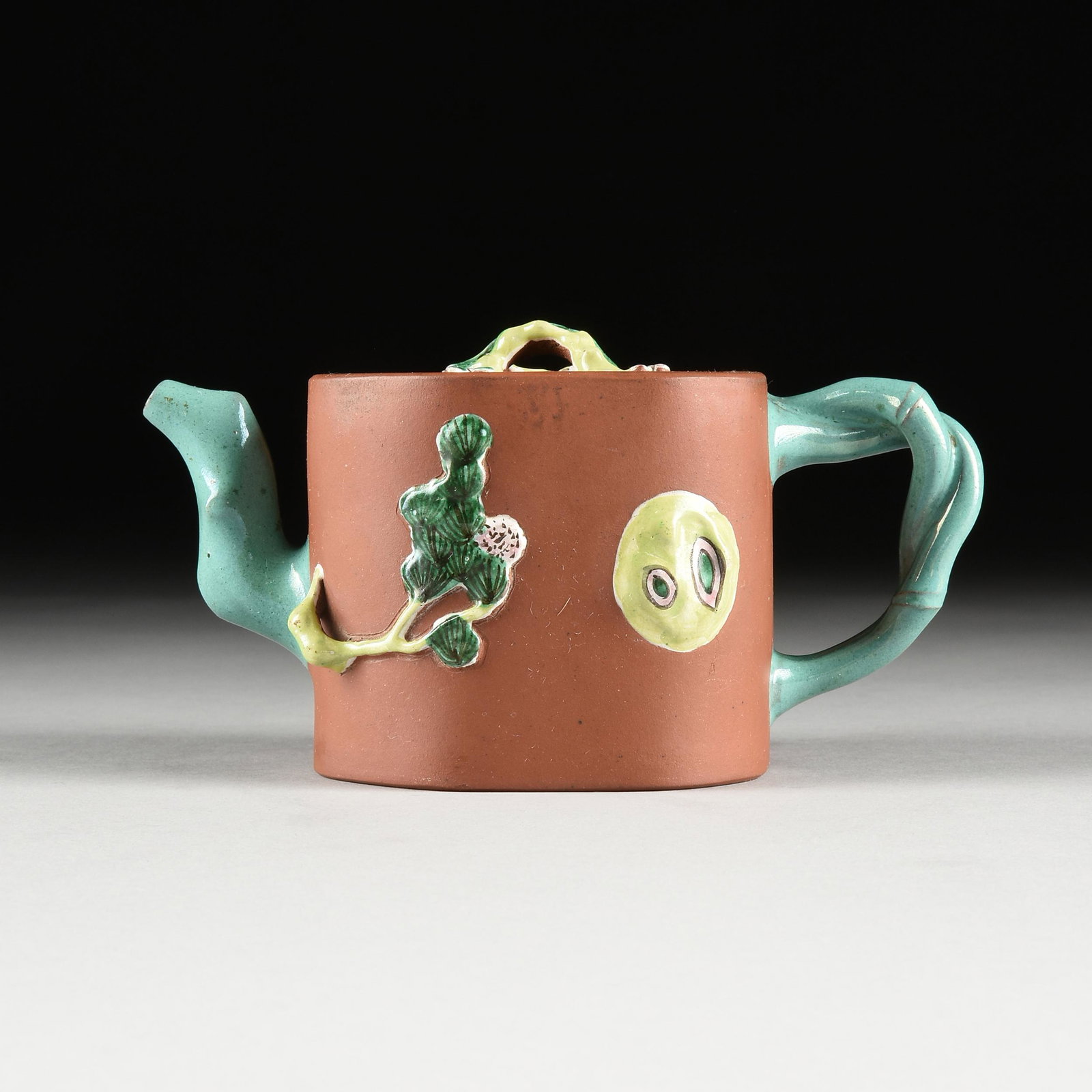 A CHINESE ENAMELED YIXING TEAPOT, THREE FRIENDS OF WINTER, SIGNED, REPUBLIC OF CHINA (1912-1949),: A CHINESE ENAMELED YIXING TEAPOT, THREE FRIENDS OF WINTER, SIGNED, REPUBLIC OF CHINA (1912-1949), brown zisha clay with a "D" shaped lid centering an enameled budding plum branch finial, impressed ver