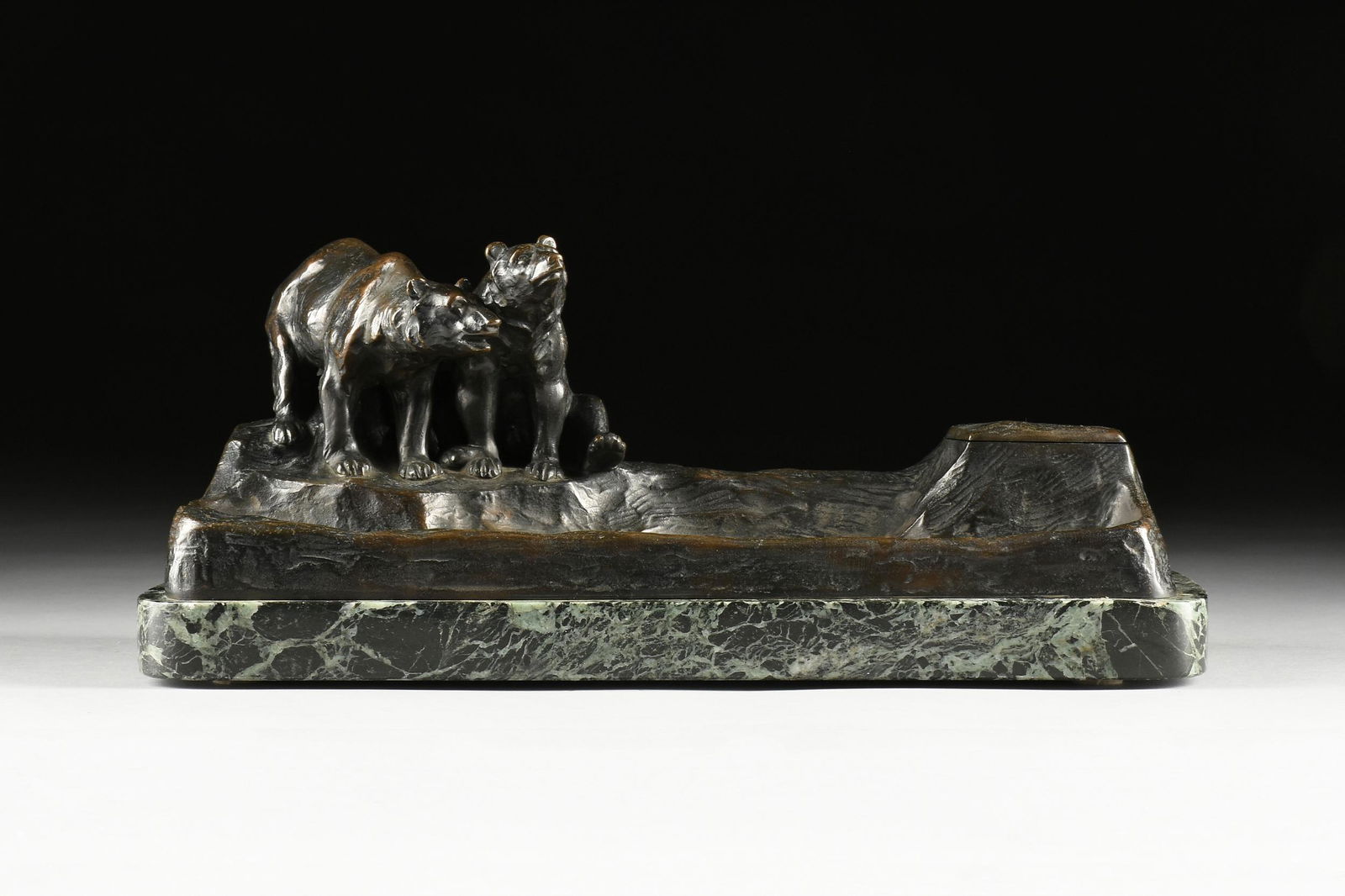 FRIEDRICH GORNIK (Austrian 1877-1943) A BRONZE INKSTAND, "Bear Couple Resting," SIGNED, VIENNA,: FRIEDRICH GORNIK (Austrian 1877-1943) A BRONZE INKSTAND, "Bear Couple Resting," SIGNED, VIENNA, EARLY 20TH CENTURY, cast as a bear couple resting alongside a stylized groundwork trough (pen trough) op
