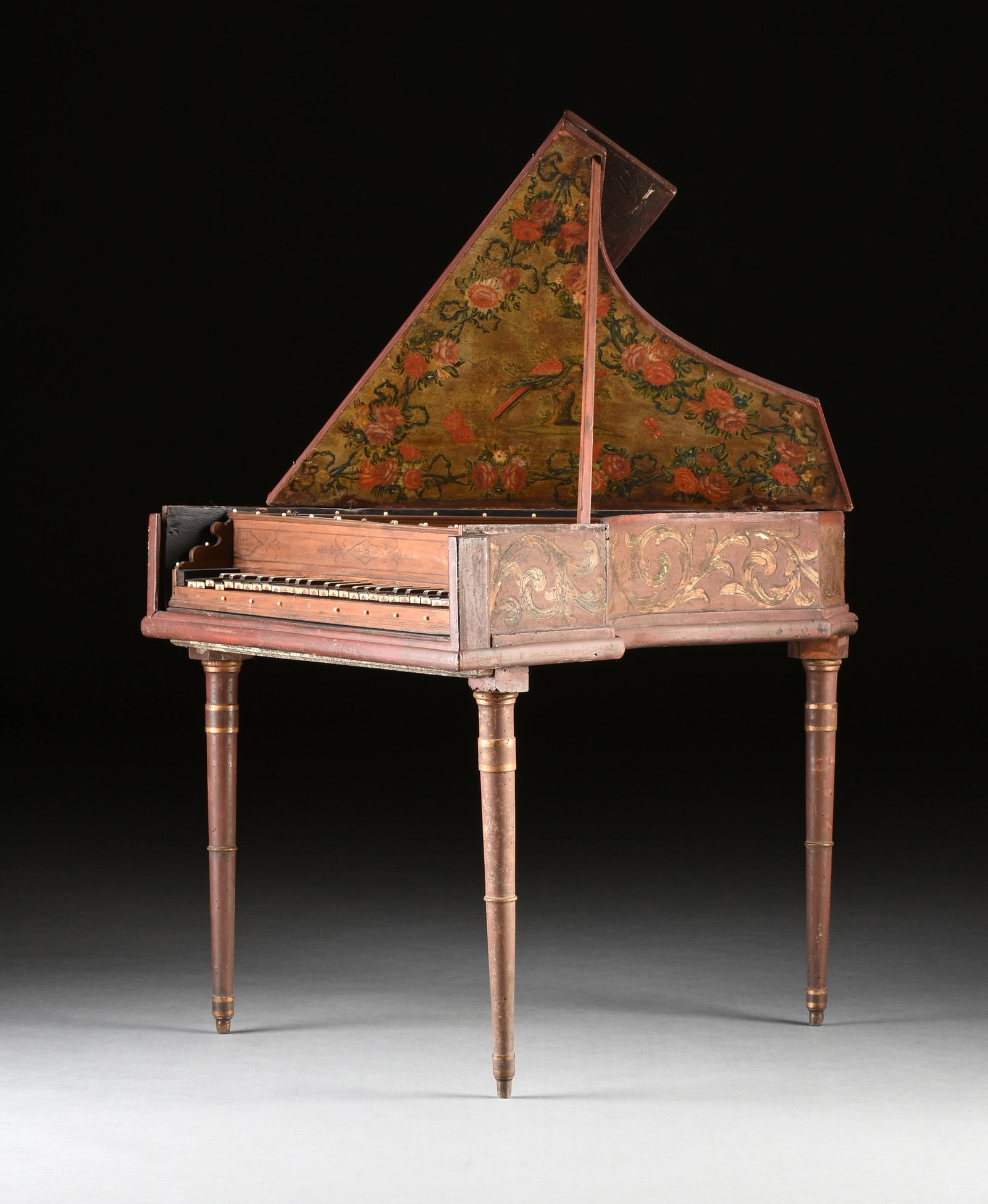 A CONTINENTAL ANTIQUE PAINTED WOOD SINGLE MANUAL VARIOUS WOODS AND BONE HARPSICHORD SPINET, 17TH/18T: A CONTINENTAL ANTIQUE PAINTED WOOD SINGLE MANUAL VARIOUS WOODS AND BONE HARPSICHORD SPINET, 17TH/18TH CENTURY, the case possibly Austro-Italian 18th/19th century and of traditional single manual form 