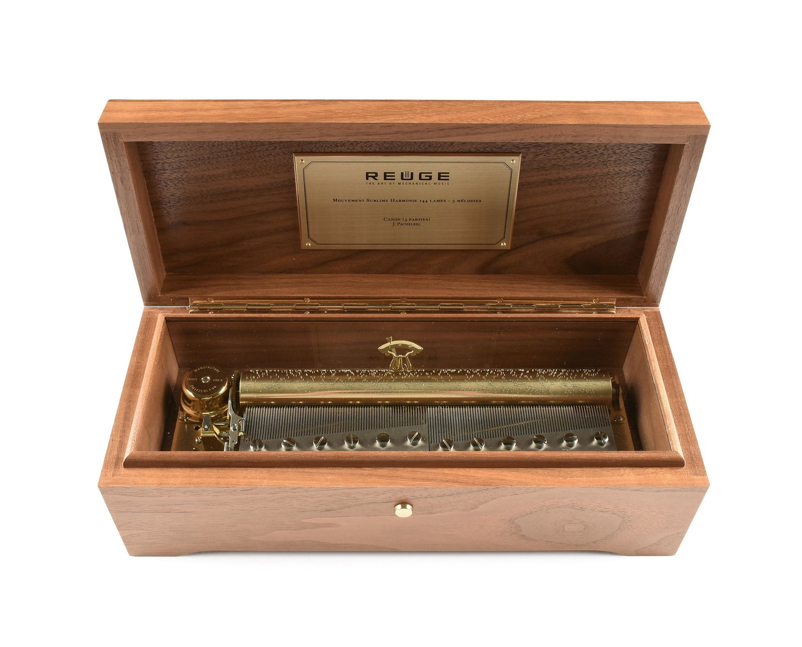 A REUGE WALNUT MUSIC BOX, "Canon in D," J. PACHELBEL, SWISS, 21ST CENTURY,: A REUGE WALNUT MUSIC BOX, "Canon in D," J. PACHELBEL, SWISS, 21ST CENTURY, the 144 note, three melody music box with walnut case and brass and stainless steel movement, with a plaque on the interior o