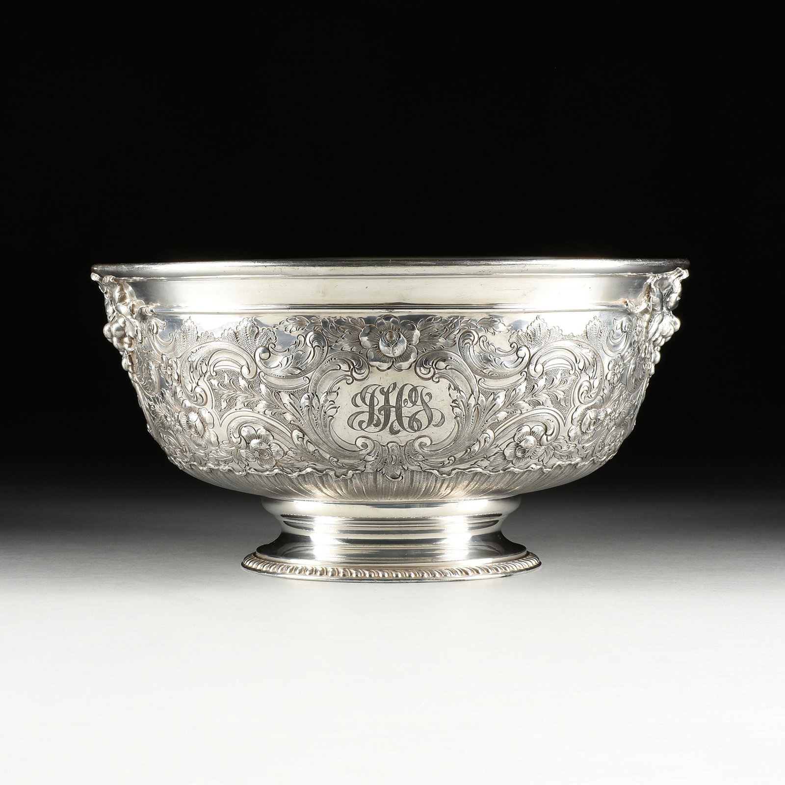 A REED & BARTON "REGENT" HAND CHASED AND REPOUSSÉ SILVER PLATED PRESENTATION PUNCH BOWL, 1936,: A REED & BARTON "REGENT" HAND CHASED AND REPOUSSÉ SILVER PLATED PRESENTATION PUNCH BOWL, 1936, with hand-engraved cartouches, "To / Mr. and Mrs. Jesse H. Jones / from the / Officers and Employees