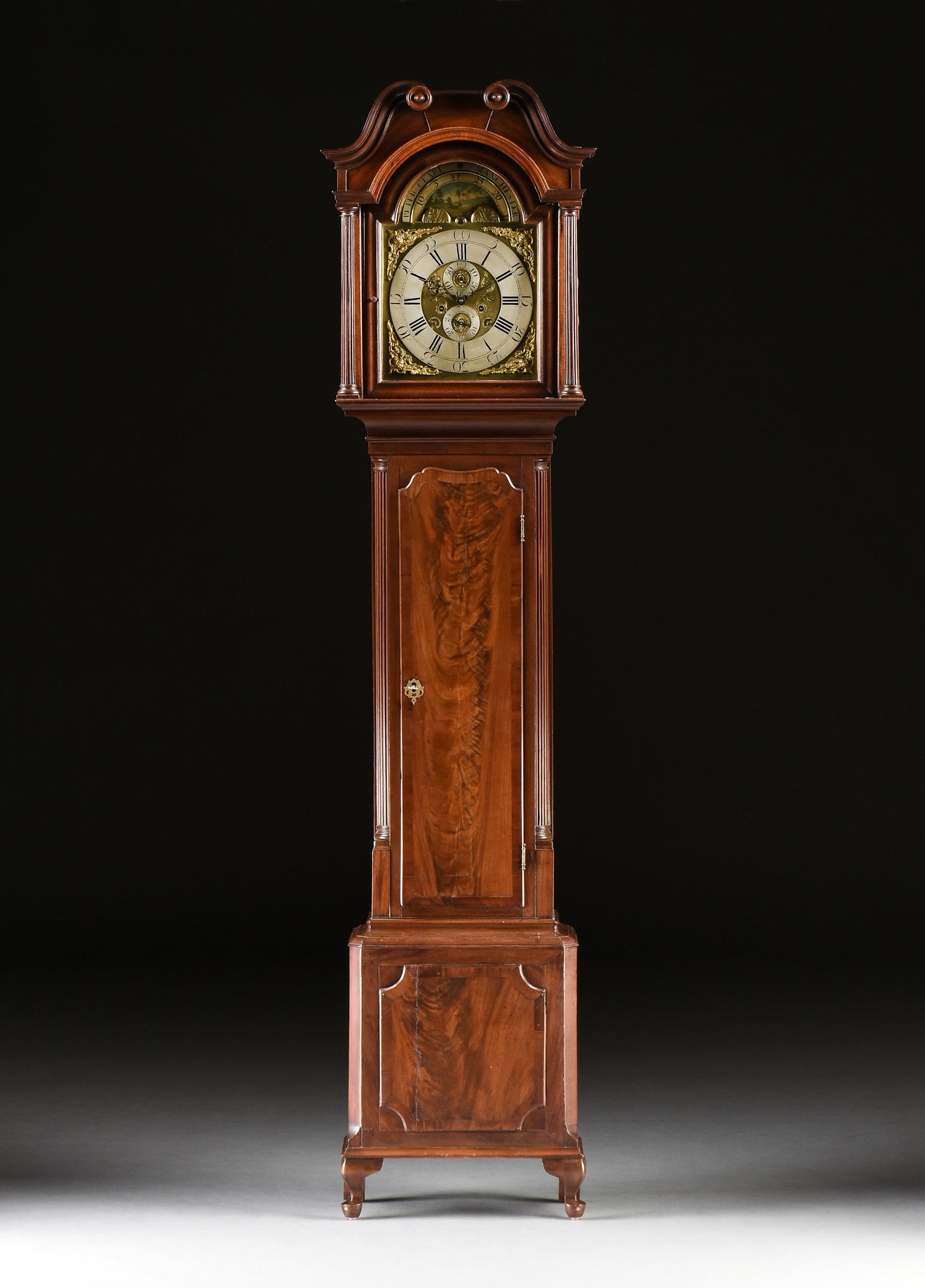 A GEORGE III FLAME MAHOGANY MOON PHASES LONGCASE CLOCK, BY PETER CLARE, MANCHESTER, 18TH CENTURY,: A GEORGE III FLAME MAHOGANY MOON PHASES LONGCASE CLOCK, BY PETER CLARE, MANCHESTER, 18TH CENTURY, The hand-painted ring dial with Arabic and Roman numerals and cut steel hands enclosing dials for seco