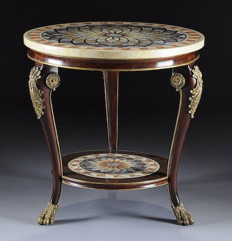 AN ITALIAN PARCEL GILT MAHOGANY PIETRA DURA GUÉRIDO: AN ITALIAN PARCEL GILT MAHOGANY PIETRA DURA GUÉRIDON, the circular top inlaid with various marbles in a stylized flower pattern enclosed by a border of inlaid folding ribbon banding above monopodiae 