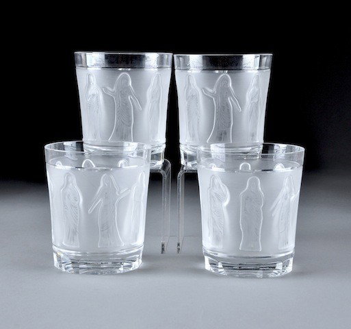 A SET OF FOUR LALIQUE "LES FEMMES" PATTERN CRYSTAL: A SET OF FOUR LALIQUE "LES FEMMES" PATTERN CRYSTAL TUMBLERS, MODERN, each with central frosted and impress molded band of maidens in classical attire standing in different positions, engraved "Lalique