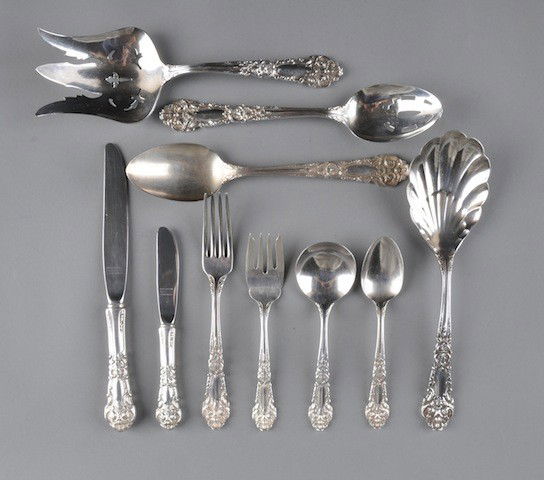 A SERVICE OF REED AND BARTON STERLING SILVER FLATW: A SERVICE OF REED AND BARTON STERLING SILVER FLATWARE, in the French Renaissance pattern comprising 12 luncheon forks, 8 salad forks, 10 luncheon knives, 12 dessert knives, 11 soup spoons, 9 coffee sp