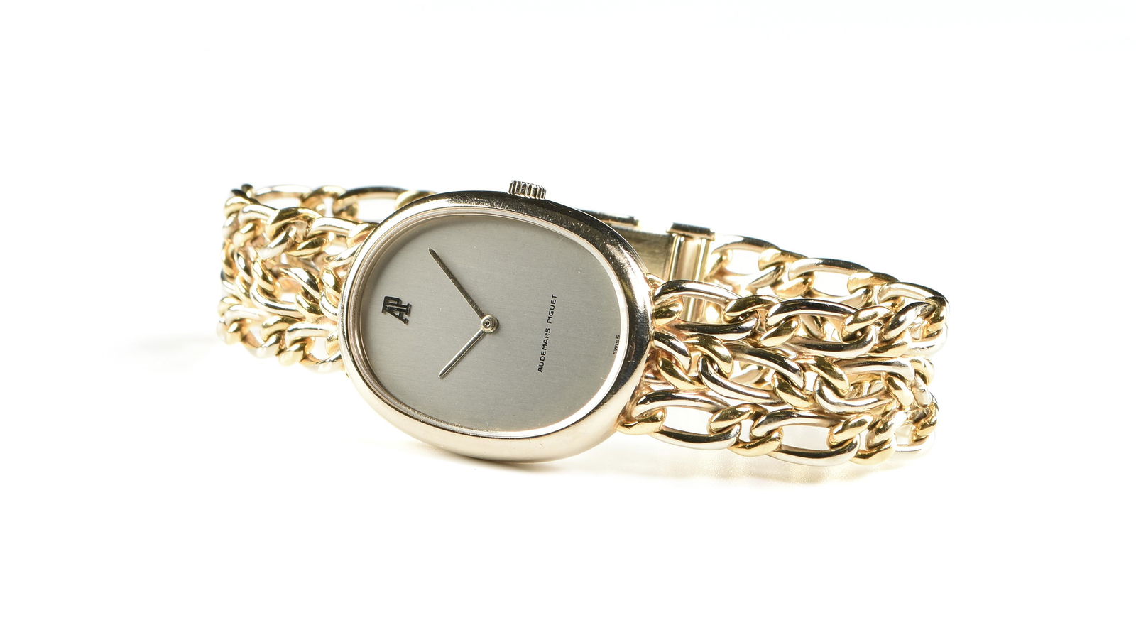 AN AUDEMARS-PIGUET 18K WHITE AND YELLOW GOLD LADIES WATCH, SWISS, CIRCA 1977, (1 of 4)