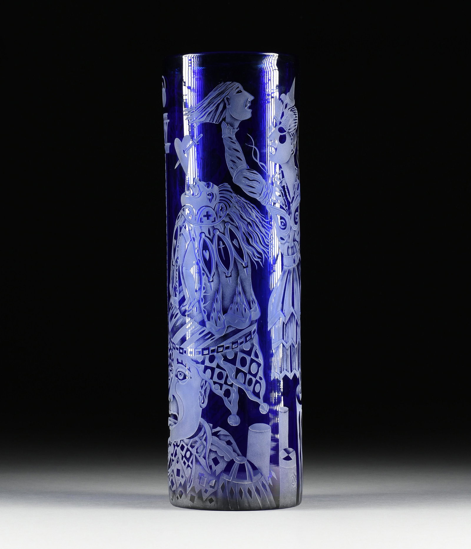 PATRICK WADLEY (American/Texas 1950-1992) AN ART GLASS VASE, "Nude Figures," 20TH CENTURY,: PATRICK WADLEY (American/Texas 1950-1992) AN ART GLASS VASE, "Nude Figures," 20TH CENTURY, etched blue glass, signed at the base, "P. Wadley, 88E." Height: 20" Diameter: 5 1/4" Provenance: Collection 
