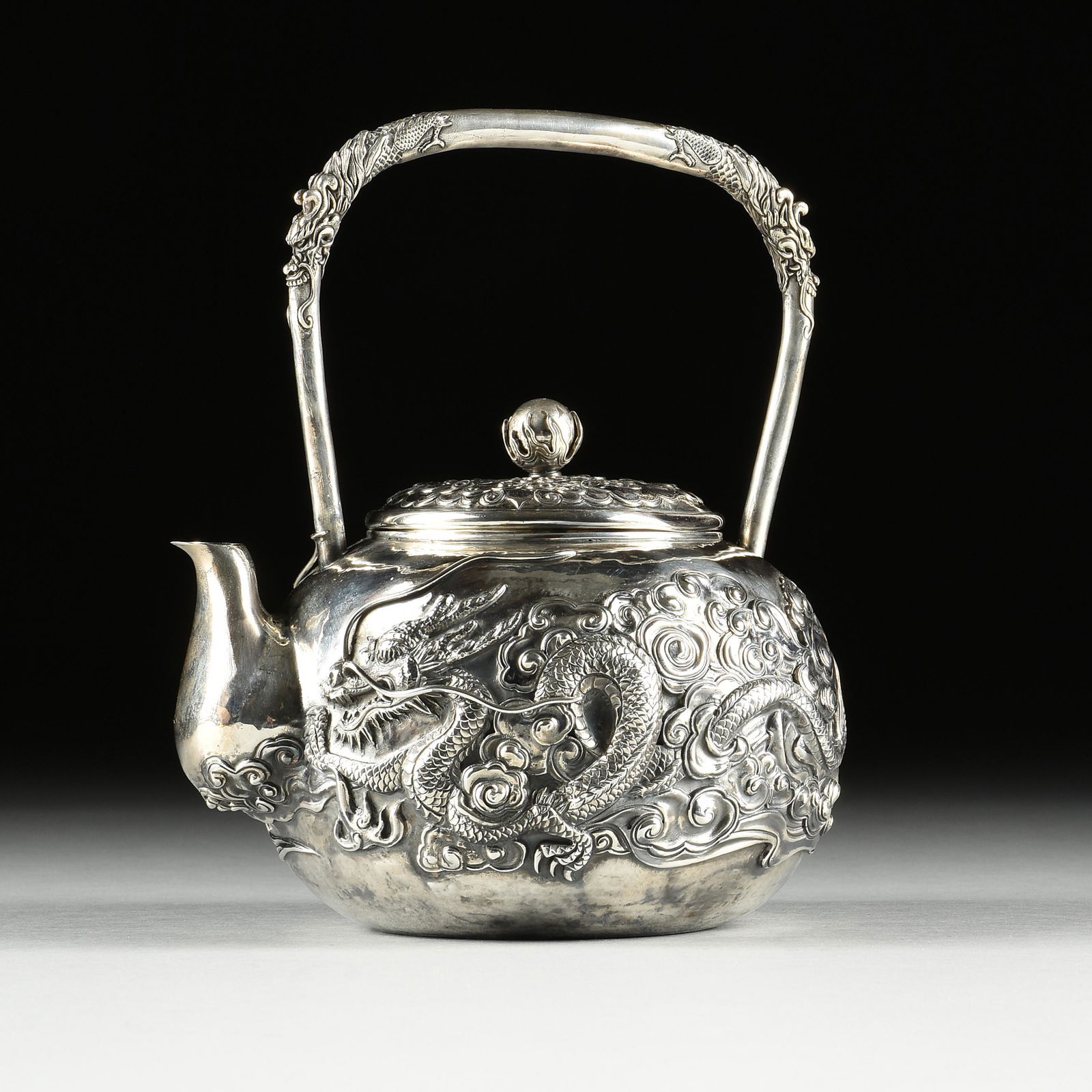 JAPANESE EXPORT REPOUSSÉ SILVER "CONTESTING DRAGONS" LIDDED TEAPOT, MARKED, MEIJI PERIOD, LATE (1 of 13)