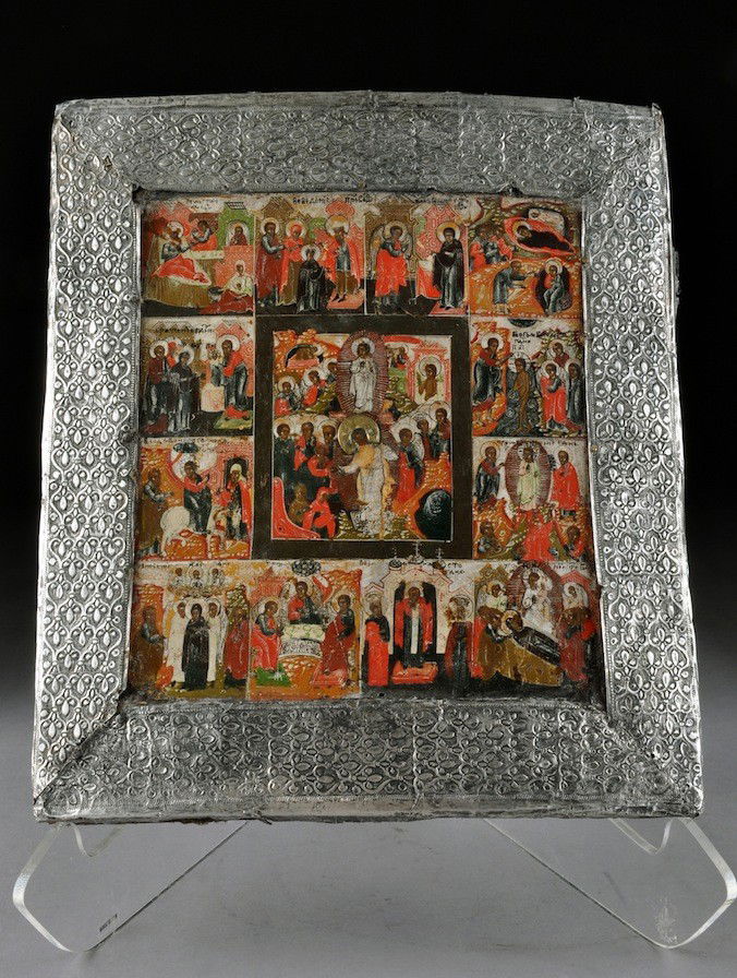 A RUSSIAN SILVER OKLAD MOUNTED ICON OF THE RESURRE: A RUSSIAN SILVER OKLAD MOUNTED ICON OF THE RESURRECTION OF CHRIST WITH MAJOR CHURCH FEAST DAYS, CIRCA 1800, of rectangular form and enclosing polychrome painted scenes in tempera on a silver leaf grou
