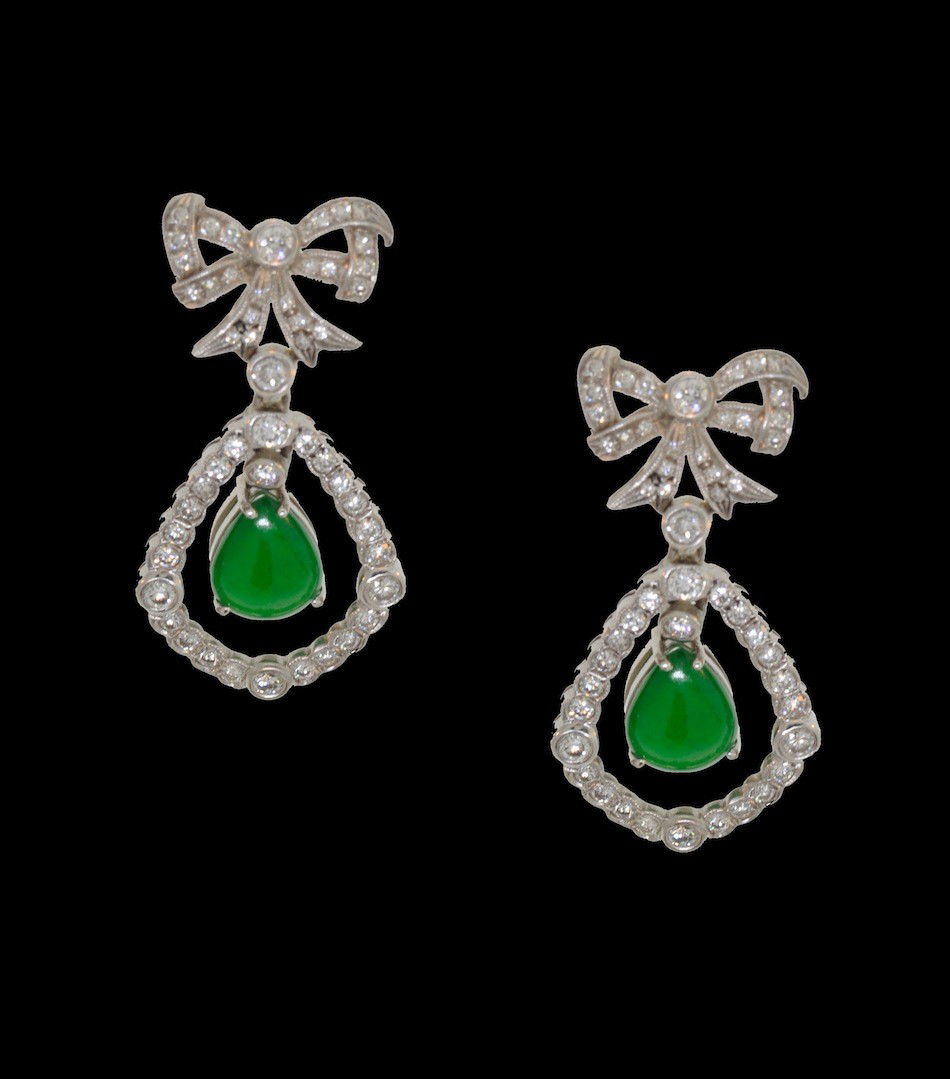 AN 18K PAIR OF CHINESE JADEITE JADE AND DIAMOND LA: AN 18K PAIR OF CHINESE JADEITE JADE AND DIAMOND LADY'S EARRINGS, the white gold mounting set with two natural, type “A” jadeite jade pear shapes measuring 7.4 x 10.4 millimeters, exceptional green