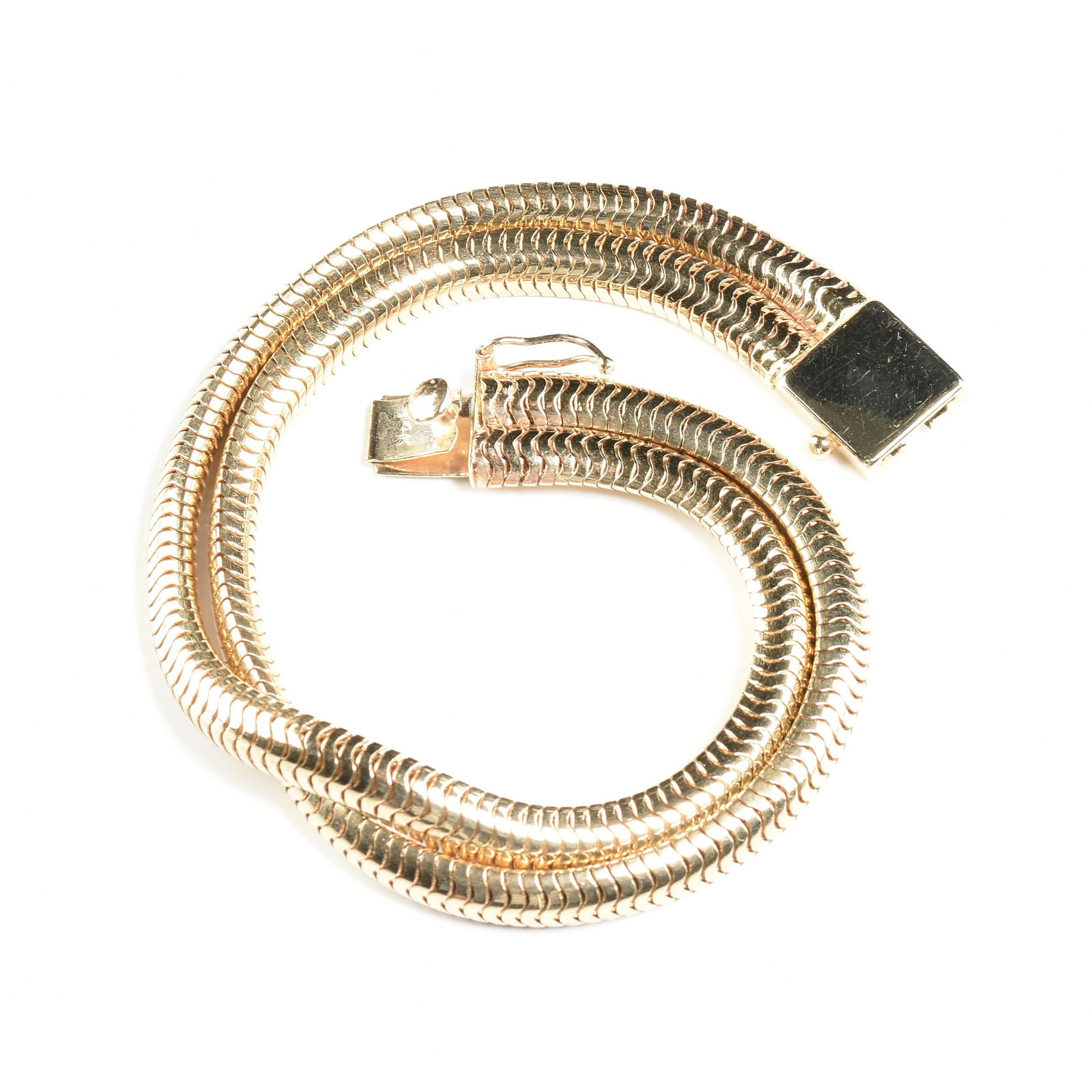 A 14K YELLOW GOLD BRACELET, 1970s, (1 of 3)
