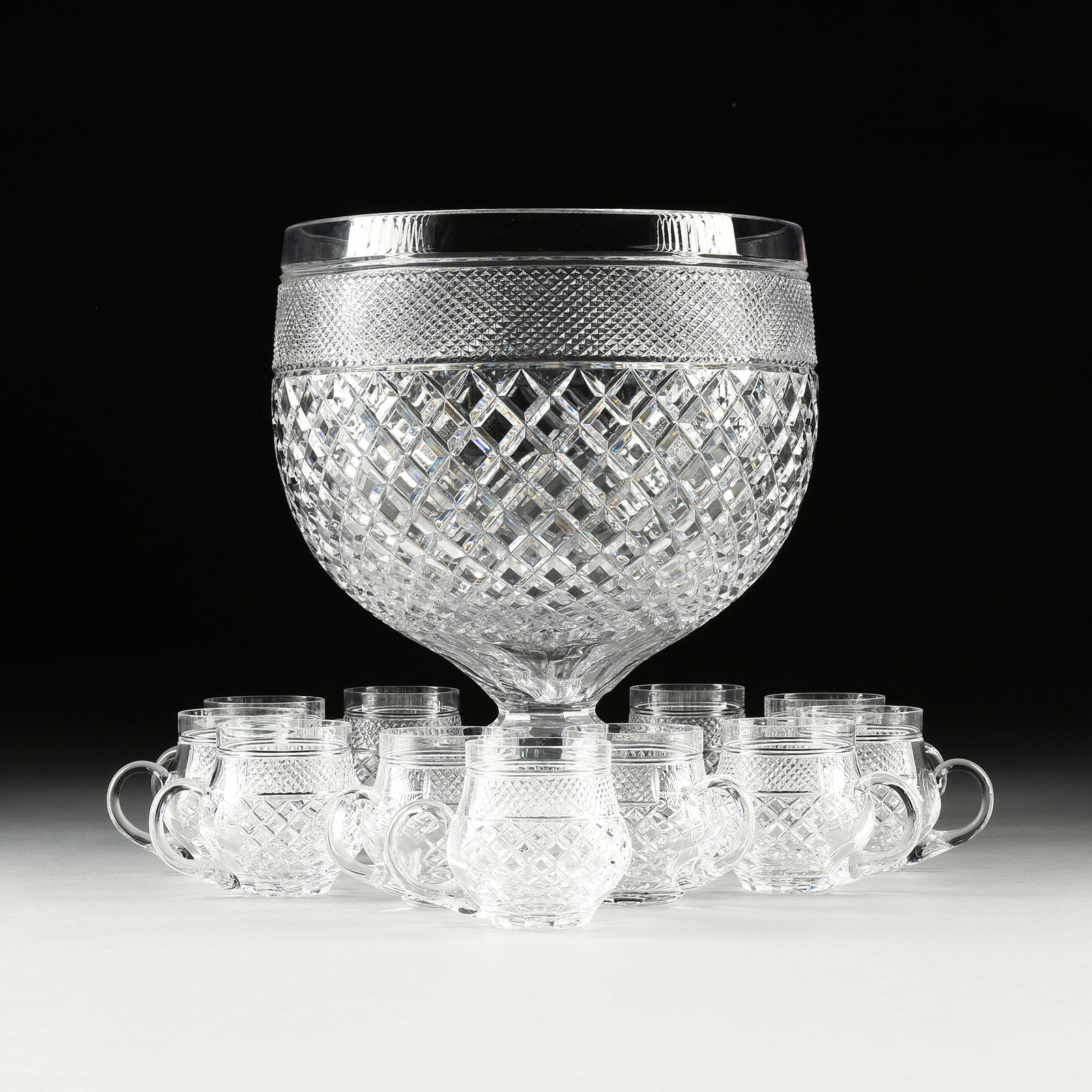 A TWELVE PIECE "WEXFORD" STYLE CRYSTAL PUNCH BOWL AND MUGS SET, 20TH CENTURY, (1 of 5)