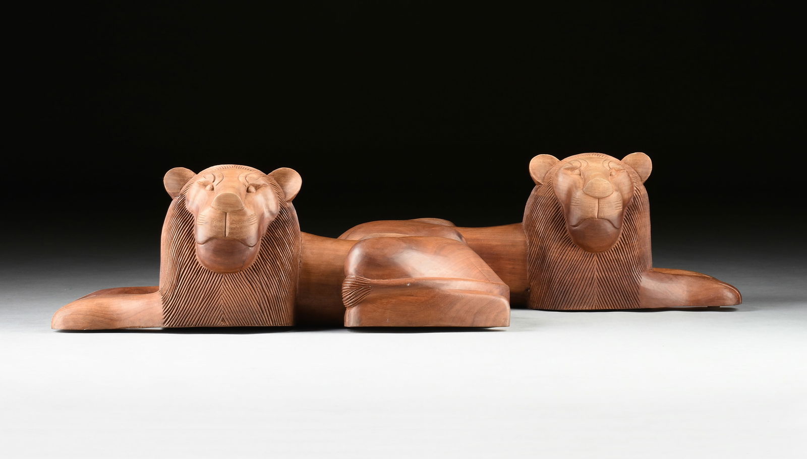 PAIR OF MINAS GERAIS CARVED WOOD LIONS, SIGNED GILBERTO, BRAZIL, CIRCA 1989, (1 of 10)