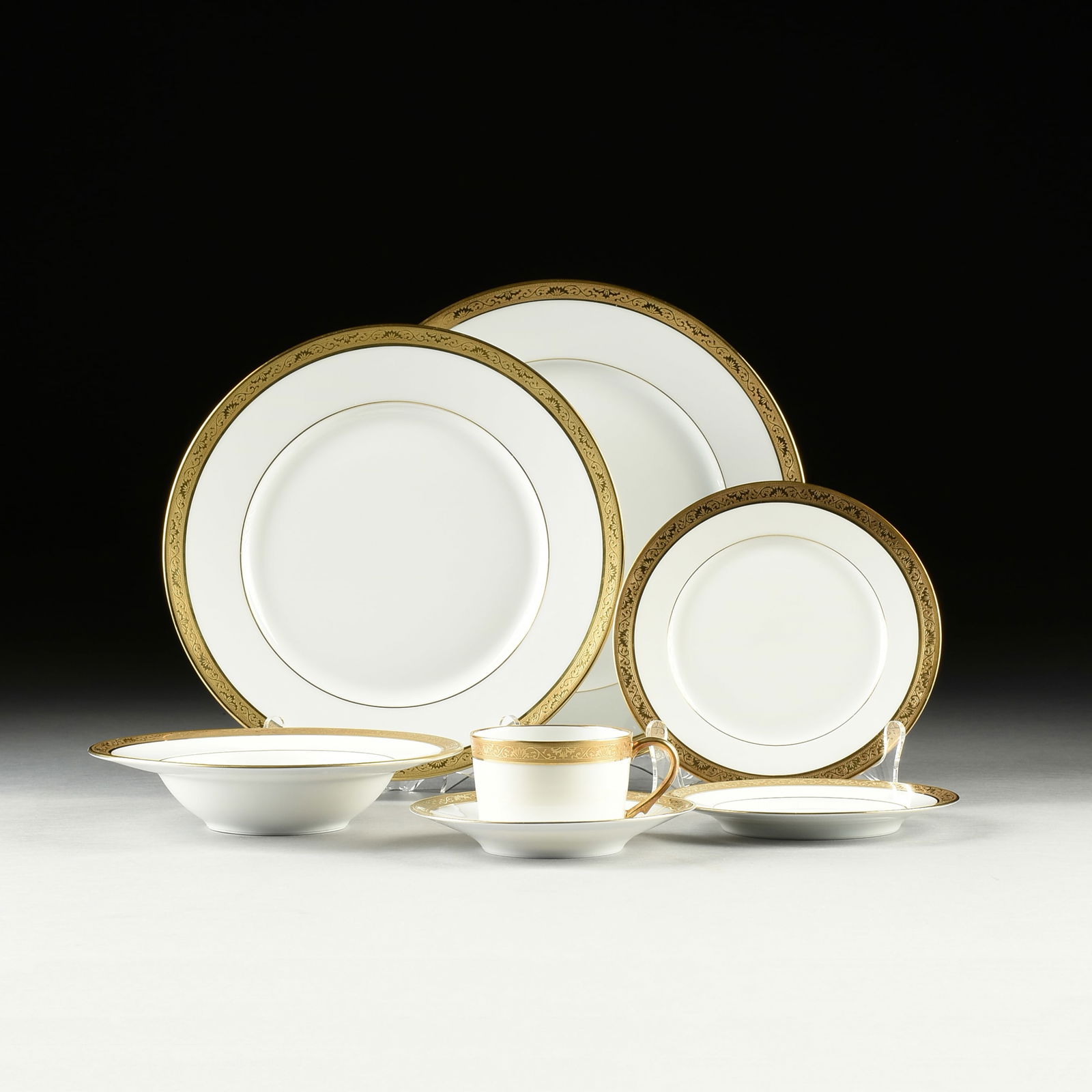 NINETY-EIGHT PIECE A. RAYNAUD ET CIE. GILT PORCELAIN DINNER SERVICE FOR FOURTEEN, "AMBASSADOR GOLD" (1 of 3)