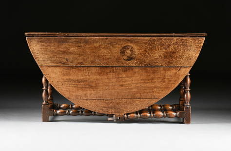 A WILLIAM AND MARY OAK BOBBIN TURNED GATE LEG DINING TABLE, ENGLISH, EARLY/MID 18TH CENTURY,: A WILLIAM AND MARY OAK BOBBIN TURNED GATE LEG DINING TABLE, ENGLISH, EARLY/MID 18TH CENTURY, the rectangular plank top with iron support straps at ends has "D" shaped leaves opening with hand wrought