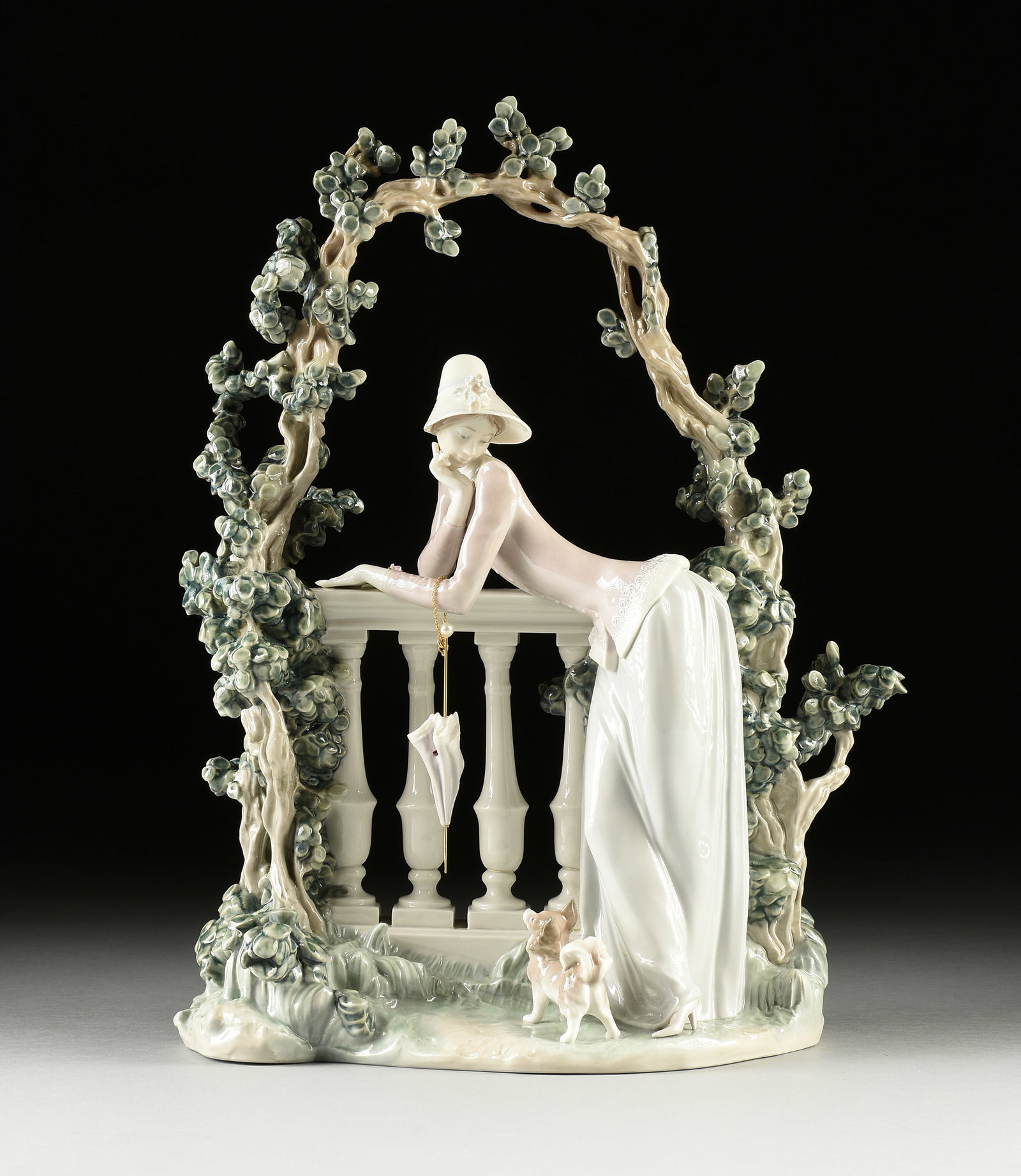 LLADRÓ PORCELAIN FIGURAL GROUP, "In the Balustrade Woman," 1974-1998,: LLADRÓ PORCELAIN FIGURAL GROUP, "In the Balustrade Woman," 1974-1998, model #1272, with the blue Lladró stamp at base; approximately 11" x 26" x 10".