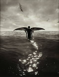 JERRY N. UELSMANN (American 1934-2022) A PHOTOGRAPH, "Angel in the Sea (Untitled)," 1993,: JERRY N. UELSMANN (American 1934-2022) A PHOTOGRAPH, "Angel in the Sea (Untitled)," 1993, archivally processed original semi-gloss black and white photograph, dated and signed in margin in monogram, "