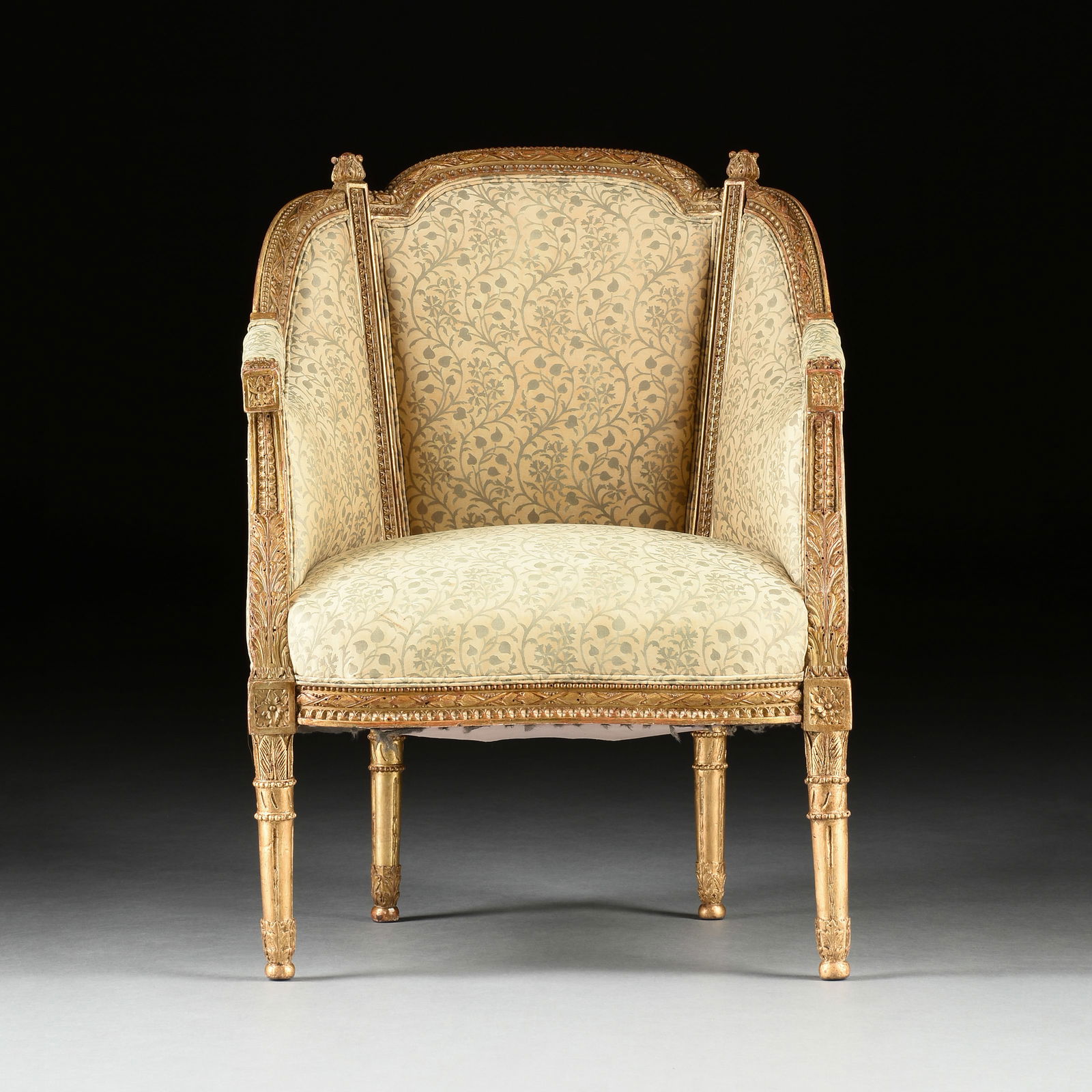 AN 18TH CENTURY ITALIAN NEOCLASSICAL PARCEL GILT WALNUT BERGÈRE, FORTUNY UPHOLSTERY, PROBABLY (1 of 8)