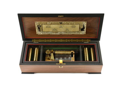 A SWISS MUSIC BOX, BY THORENS, FIVE INTERCHANGEABLE CYLINDERS, MID 20TH CENTURY,: A SWISS MUSIC BOX, BY THORENS, FIVE INTERCHANGEABLE CYLINDERS, MID 20TH CENTURY, the top inlaid with marquetry centered by walnut and black lacquer lifting open to reveal a glazed window that lifts to