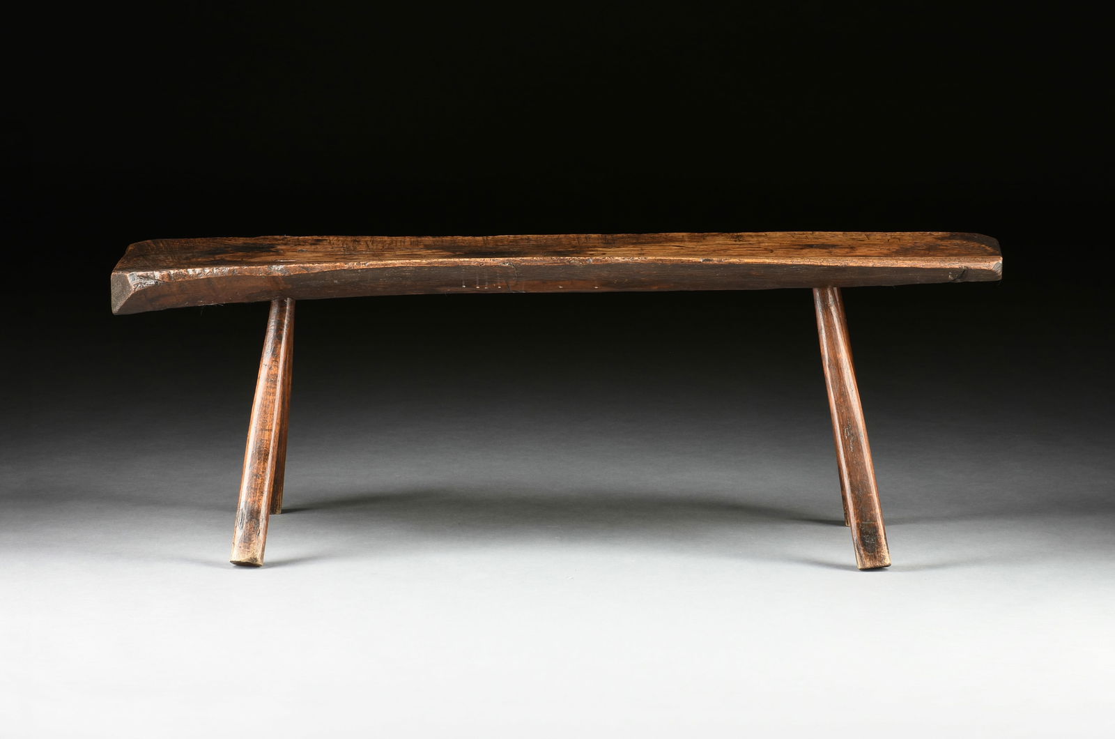 A PRIMITIVE OAK PIG BENCH, CONTINENTAL, 18TH CENTURY, (1 of 8)