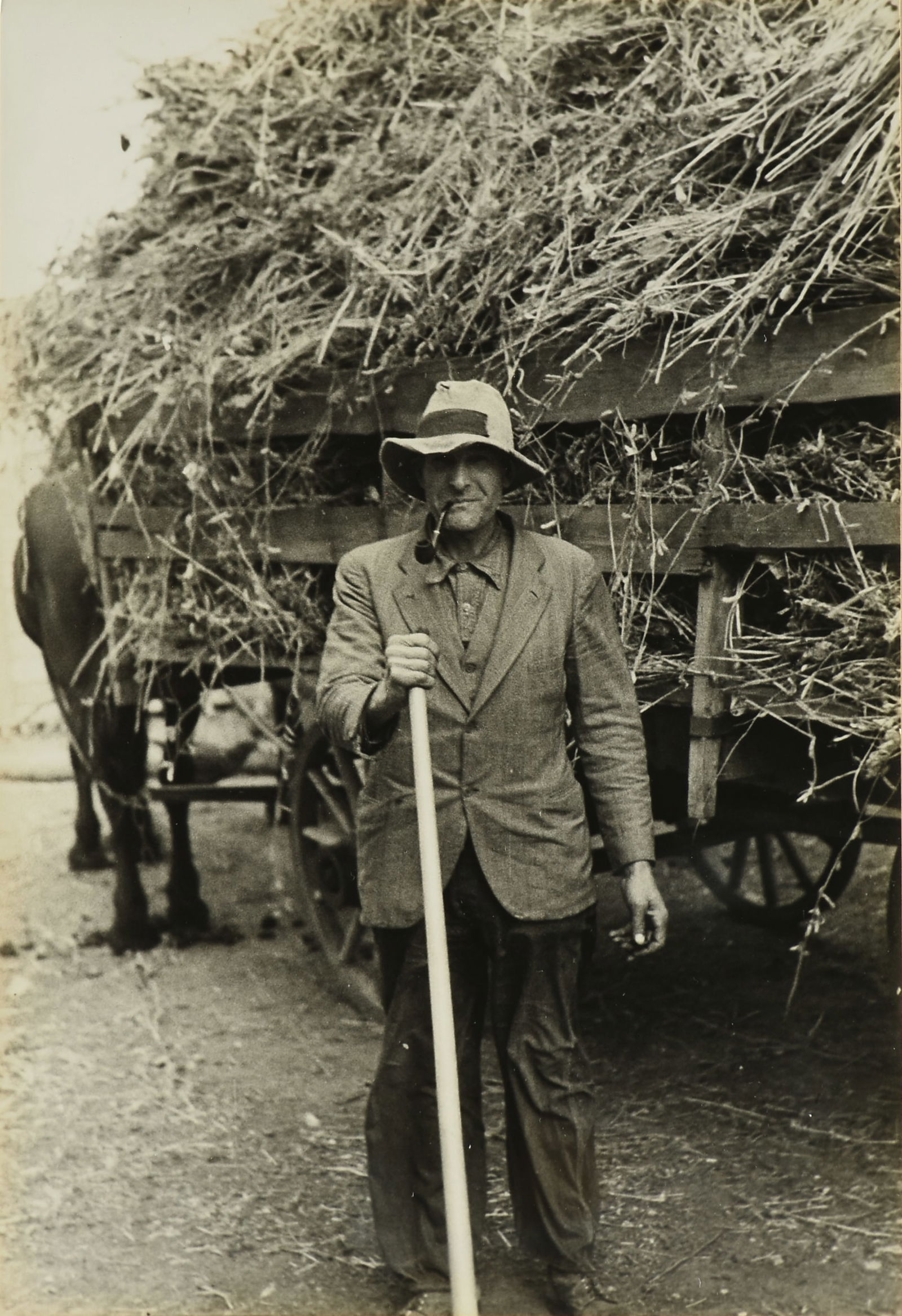 RUSSELL LEE (American/Texas 1903-1986) TWO PHOTOGRAPHS, "Farmer with Pipe" and "Farmhouse Interior," (1 of 10)
