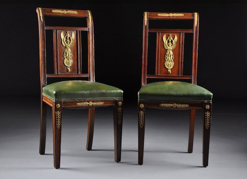 A SET OF EIGHT EMPIRE STYLE GILT BRONZE MOUNTED MA: A SET OF EIGHT EMPIRE STYLE GILT BRONZE MOUNTED MAHOGANY CHAISES, LATE 19TH CENTURY, each with scrolled rectangular crest rail centering florette and stylized branches mounts above a conforming splat
