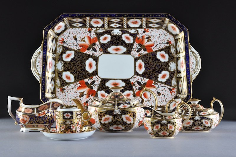 A GROUP OF ROYAL CROWN DERBY TEA/COFFEE PORCELAIN: A GROUP OF ROYAL CROWN DERBY TEA/COFFEE PORCELAIN WARES, IMARI PATTERN, NO. 2451, AND OLD IMARI PATTERN, NO. 1128, 19TH/20TH CENTURIES, each parcel gilt and decorated in traditional pattern and palett
