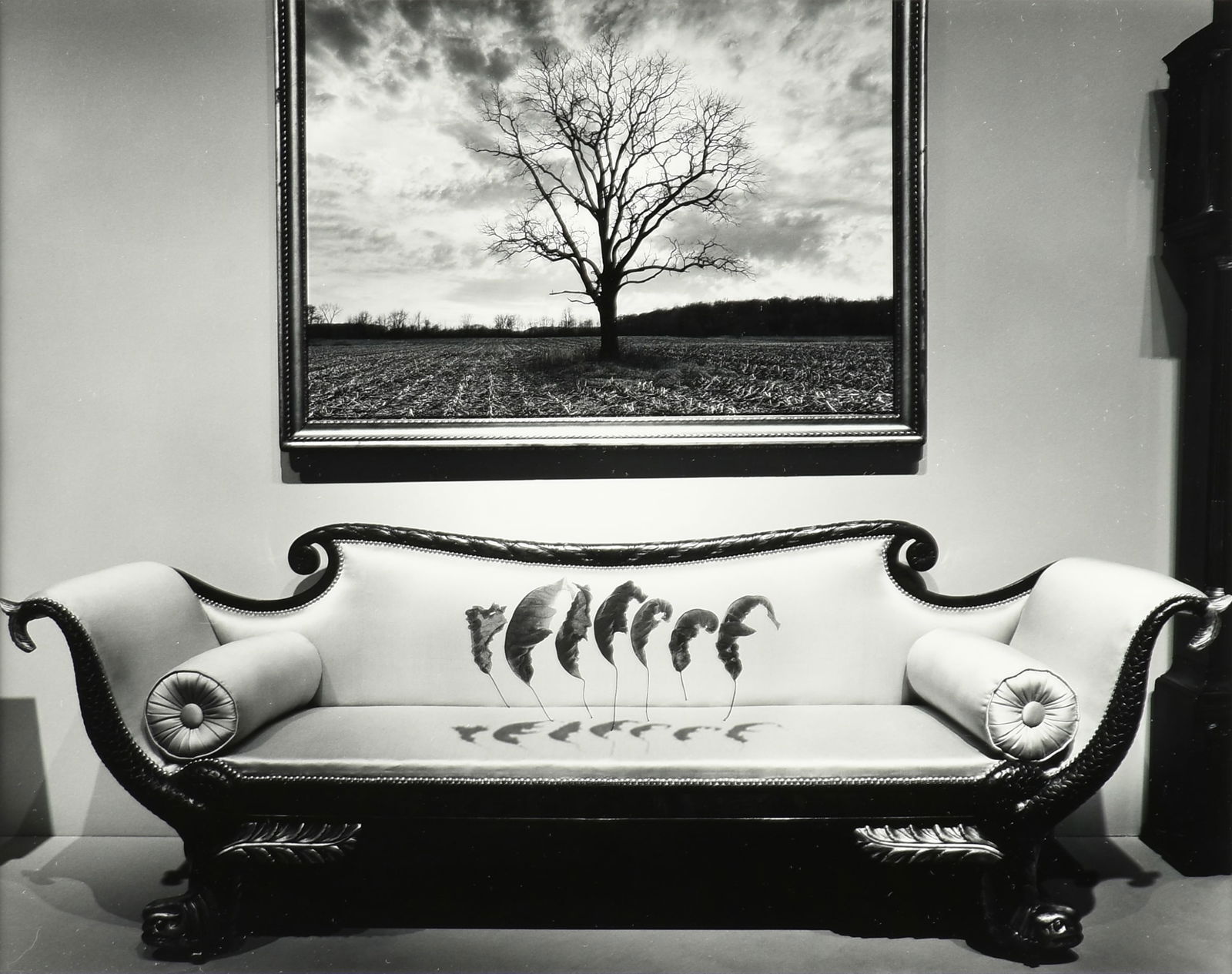 JERRY UELSMANN (American 1934-2022) A PHOTOGRAPH, "Leaves Over Couch," 1987 (1 of 9)