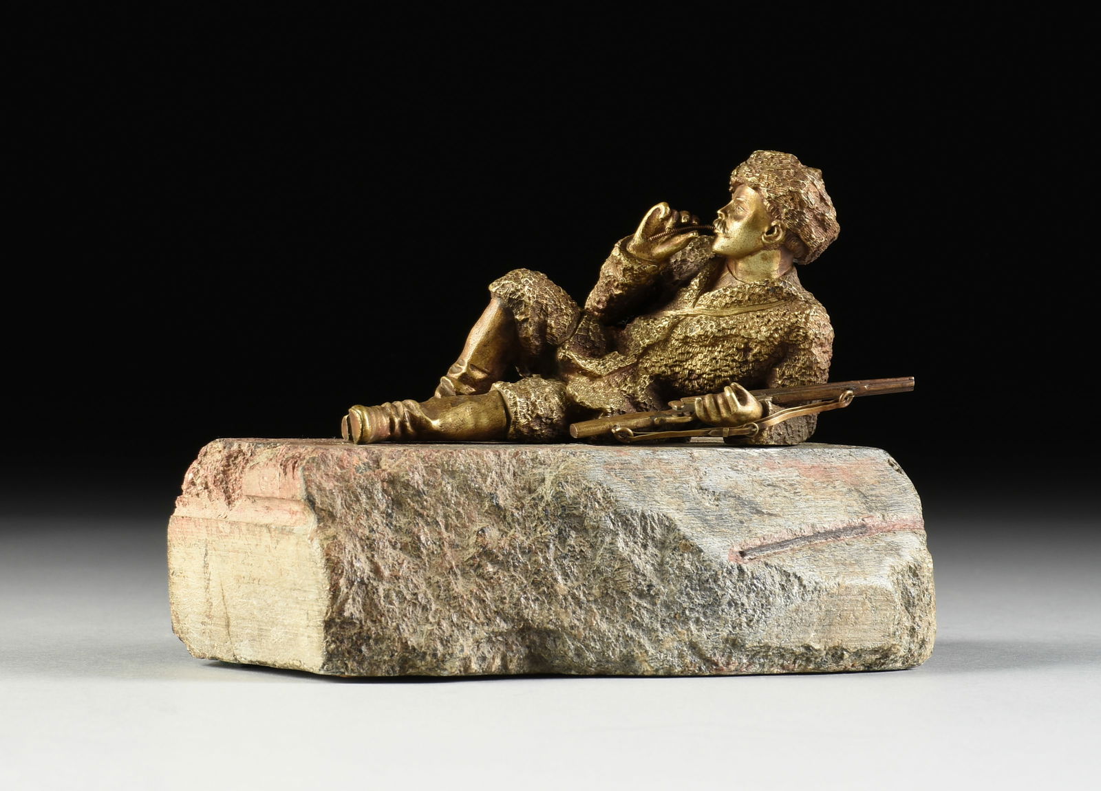 RUSSIAN SCHOOL, A SCULPTURE, "Reclining Huntsman," 20TH CENTURY, (1 of 8)