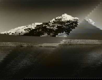 LEN PRINCE (American b. 1953) A PHOTOGRAPH, "Snow Capped Mountains and Water," 20TH/21ST CENTURY,: LEN PRINCE (American b. 1953) A PHOTOGRAPH, "Snow Capped Mountains and Water," 20TH/21ST CENTURY, black and white photograph, stamped at L/L, "© LEN PRINCE;" 11" x 14", framed 17 1/4" x 21 1/4".
