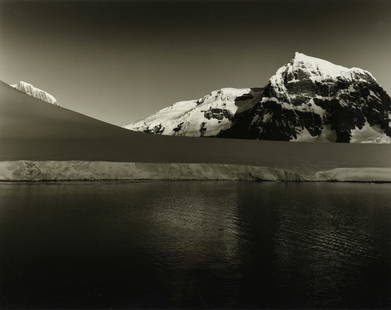 LEN PRINCE (American b. 1953) A PHOTOGRAPH, "Snow Capped Mountains and Water," 20TH/21ST CENTURY,: LEN PRINCE (American b. 1953) A PHOTOGRAPH, "Snow Capped Mountains and Water," 20TH/21ST CENTURY, black and white photograph, stamped at L/L, "© LEN PRINCE;" 11" x 14", framed 17 1/4" x 21 1/4".