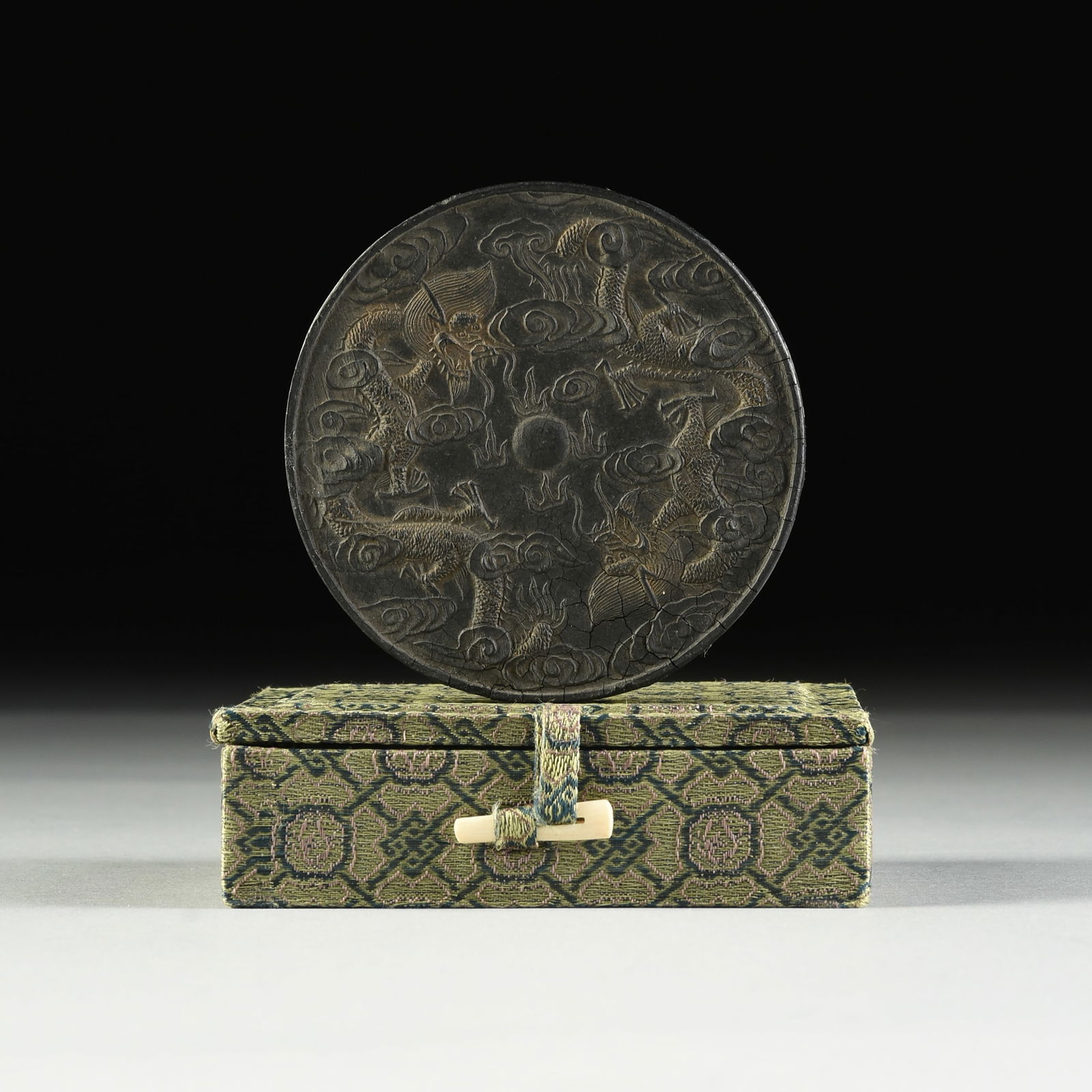 A CHINESE INK CAKE, DRAGONS IN THE CLOUDS, QING DYNASTY (1644-1912), QIANLONG REIGN (1736-1795), (1 of 5)