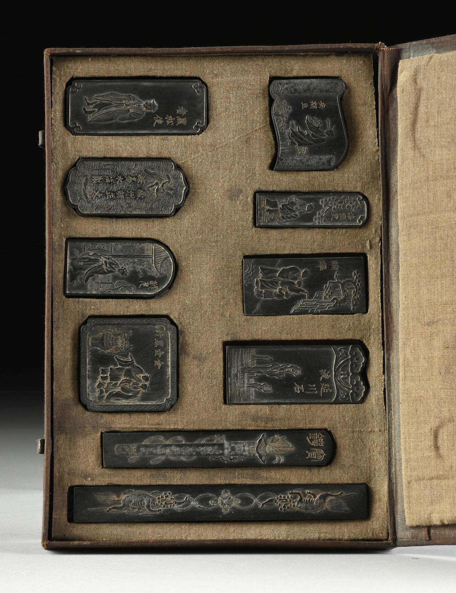 TEN CHINESE LITERATI INK STICKS AND CAKES, FIGURES, SWORD AND DRAGONS, ATTRIBUTED TO THE QING (1 of 14)