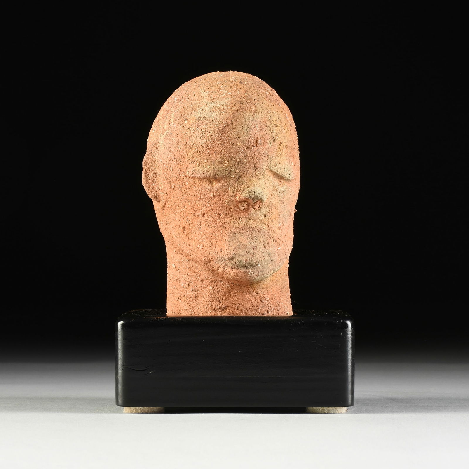AN AFRICAN TERRACOTTA HEAD OF MAN ON STAND, KATSINA CULTURE, NIGERIA, APPROXIMATELY 200 BC-AD 900, (1 of 5)