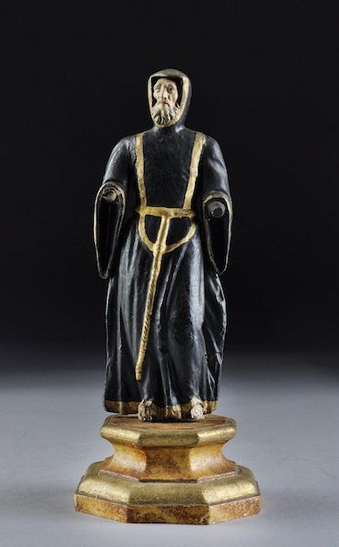 TWO VINTAGE PARCEL GILT PAINTED WOOD AND PAPIER-MÂC: TWO VINTAGE PARCEL GILT PAINTED WOOD AND PAPIER-MÂCHÉ SANTOS FIGURES, 19TH & 20TH CENTURIES, one depicting St. Francis, possibly Italian, 19th century, standing with the Infant Jesus in one arm and