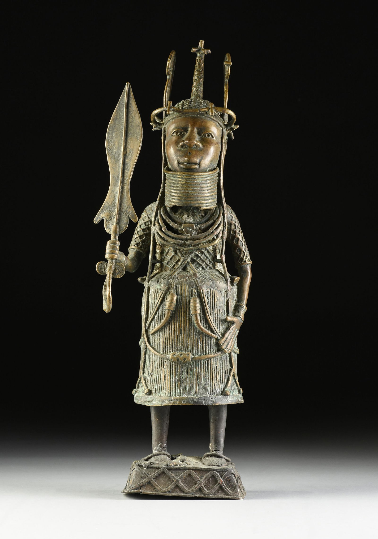 A WEST AFRICAN BRONZE SCULPTURE OF AN OBA, BENIN, 20TH CENTURY (1 of 14)