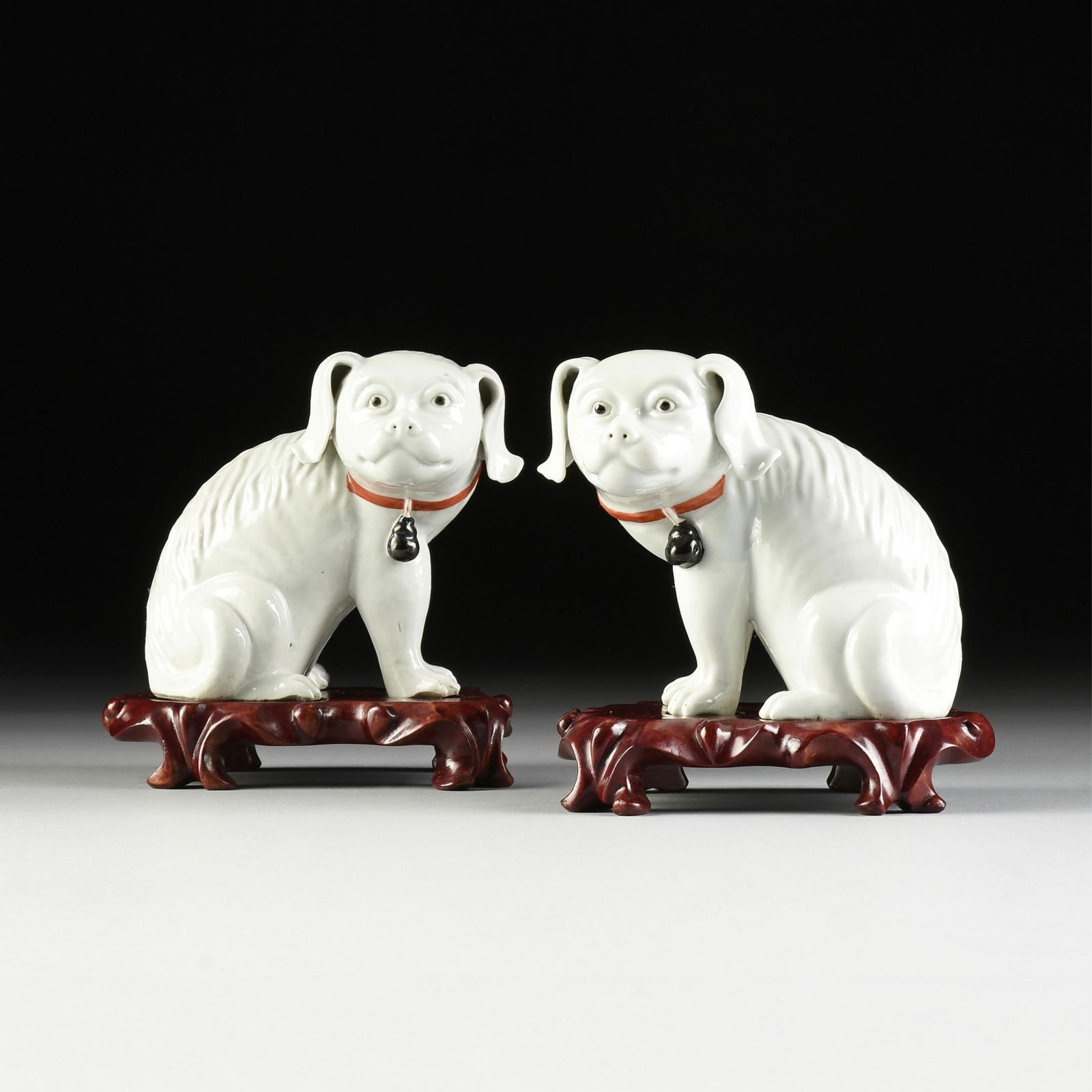 A PAIR OF BLANC DE CHINE GLAZED AND PAINTED PORCELAIN FOO DOG GUARDIANS ON STANDS, PROBABLY CHINA, (1 of 8)